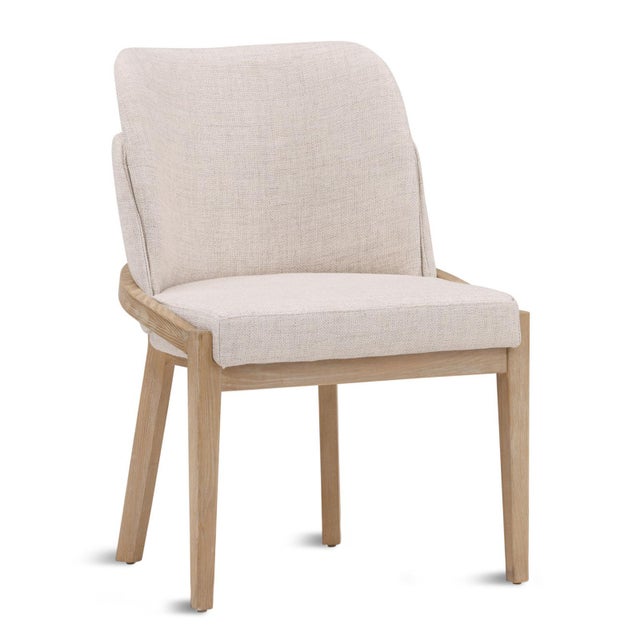 Upholstered contemporary dining chair which brings easy sophistication to any dining space. Beautiful grained solid elm...