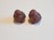 A poetic pair of hand-carved wooden bird sculptures displaying remarkable warmth, character, and finely detailed feather...