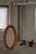 This sculptural wall mirror was crafted in Sweden during the 1960s by Glasmäster Markaryd and features a broad, rounded...
