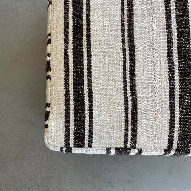 DESCRIPTION Great as a footstool or extra seating, our handwoven hemp poufs are at home in any room of the house. Woven of...