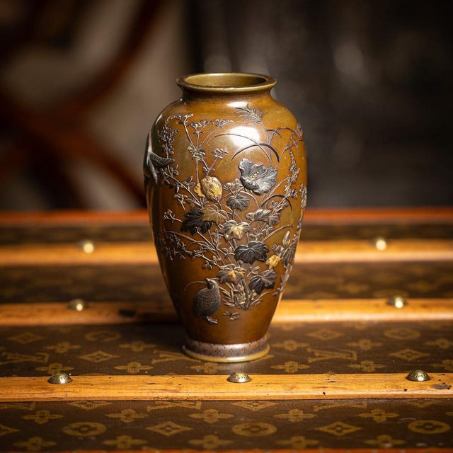 Antique 19th Century Japanese Meiji period Mitsunorian inlaid bronze ovoid vase. Decorated in high relief with shibuichi,...