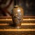 Antique 19th Century Japanese Meiji period Mitsunorian inlaid bronze ovoid vase. Decorated in high relief with shibuichi,...