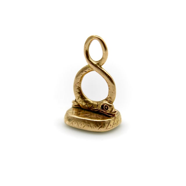 Circa the 1840’s, this rare dolphin fob has two dolphins with intertwined tails that form a bail. The dolphins are hand-...