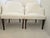 Beautiful tailored sophisticated 1940s club lounge chairs newly upholstered in white linen. Elegant wooden tapered legs.