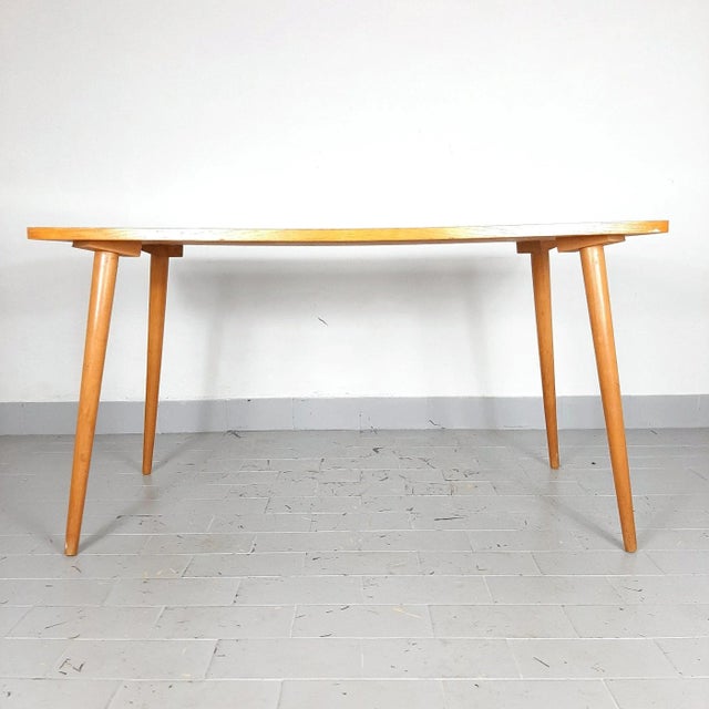 Elegant coffee table from the 60s. Despite It's age, it is in good condition. The photo shows slight signs of wear and...