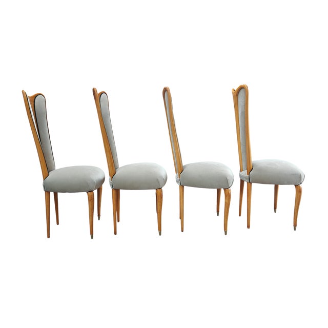 Refined and distinctive, these four 1960s dining chairs perfectly embody the elegance of fine italian craftsmanship of the...