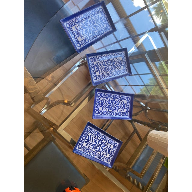 This is a beautiful collection of blue and white rectangular serving dishes. All four of these dishes are hand painted to...