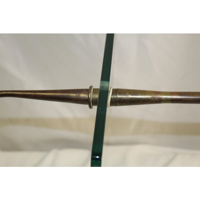 A Custom made Modern/Deco solid brass side table . Has a glass top that is 12" by 9" . And with a splade handle at the top...