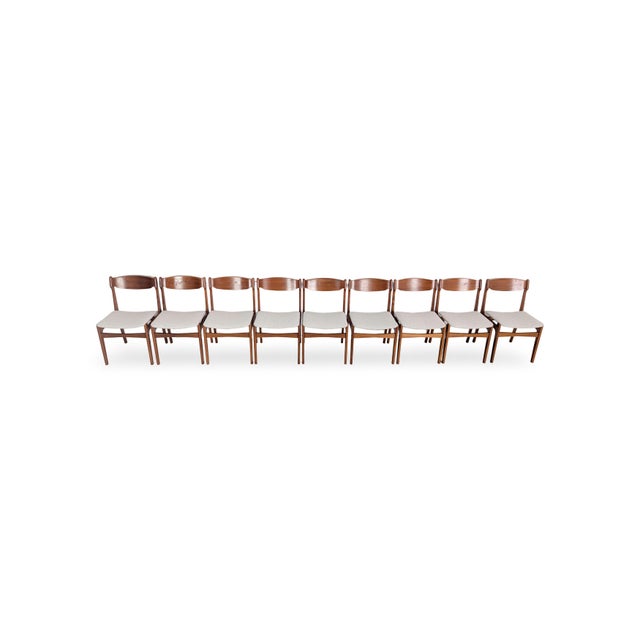 We are offering a beautiful set of nine vintage Danish chairs from the 1960s for sale. The design is reminiscent of Erik...