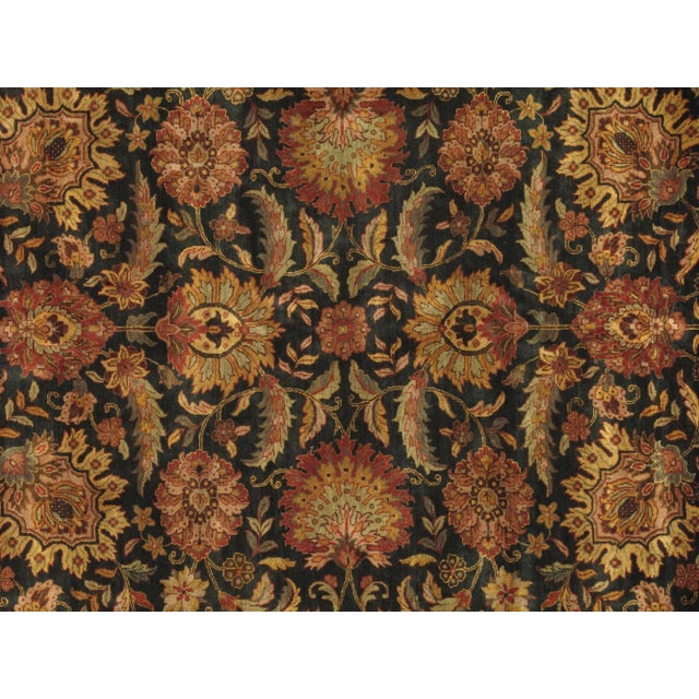 Add a beautiful contemporary style to your home with this Pasargad Agra Hand-knotted Red and Ivory Wool Rug. This rug...