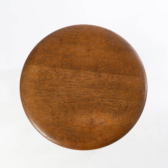 Made circa 1900 with beautiful iron claw and glass ball feet. Seat height adjust from 19" to 23".