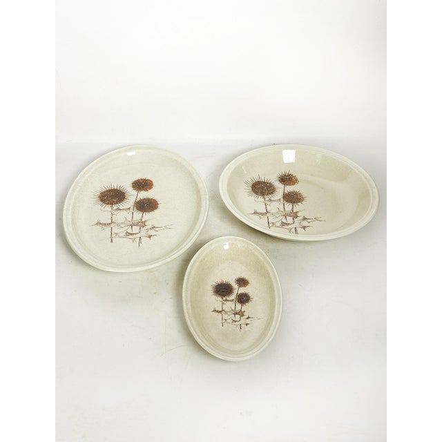 The dimensions are those of the largest of the 3 dishes. Set of three Sarreguemines ceramic dishes with a thistle design,...