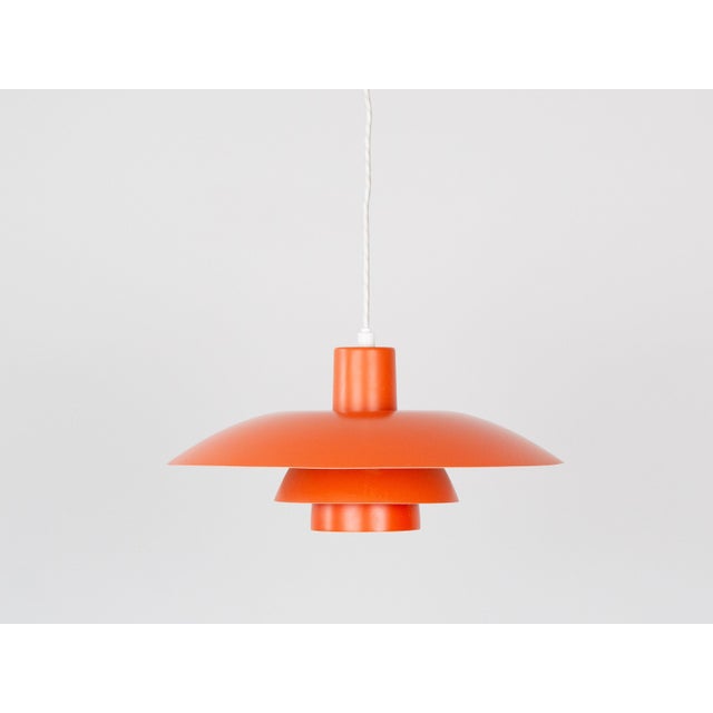 The ph 4/3 lamp is an absolute classic, designed by the renowned danish designer and architect poul henningsen. It has...