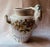 A delightfully whimsical and highly unique pair of late 19th to early 20th-century antique English Cottage Style porcelain...
