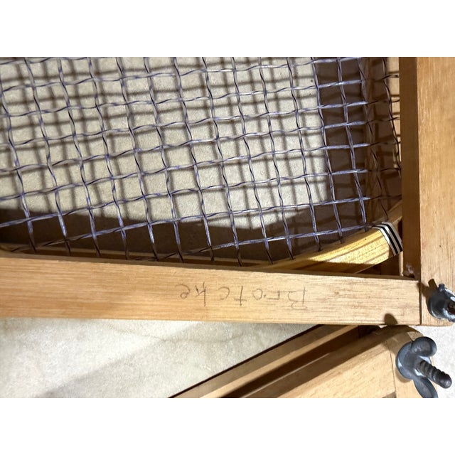 Elevate your gallery wall or shelf styling with this handsome pair of mid-century T.A. Davis "Hi-Point" wooden tennis...