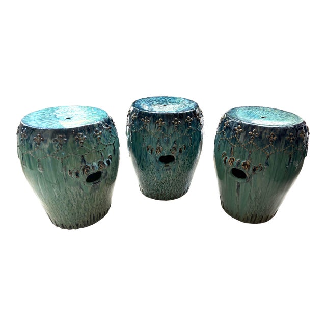 Curated Designer Set of 3 Large Teal Drip-Glazed Chinese Ceramic Garden Stools With Raised Garland Motif For Sale