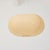 Sculptural paper pendant lamp shade in the style of Isamu Noguchi, produced by an unknown manufacturer during the 1990s....
