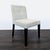Low back chair on wood legs with button tufting Brand Crate & Barrel Dimensions 19.0ʺW x 20.5ʺD x 33.8ʺH Seat Height 17.75...
