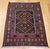 Vintage Afghan Baluch Tribal Area Rug, meticulously hand-knotted in the mid-1900s. Woven by the nomadic Baluch tribes of...