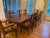 The expansive Solid Mahogany Chippendale Dining set has been restored, and absolutely beautiful with prominent grain...