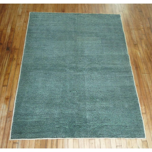 One of a kind vintage Turkish Anatolian in emerald green and tiny specs of black. Measures: 4'11" x 6'9".