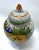Vintage Italian Deruta style lidded tea canister. Hand Painted Floral and leaf designs. Marked "Tea" on the front, and...