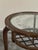 Round coffee table, 1950s, Italian-made, in the style of Paolo Buffa. Round wooden frame, original glass top with engraved...