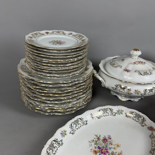 A table setting of exceptional refinement and undeniable rarity. This exquisite service in the finest German porcelain is...