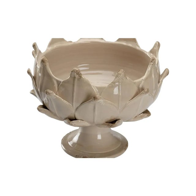 Create a centerpiece for your table by adding a dried arrangement, fruit or decorative orbs to this contemporary bowl....