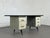 A 1950s desk with an all-metal frame and a dark green resin top. Designed by Behin, the French specialist in school and...