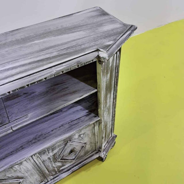 Item : discover this refined vintage wooden sideboard, a unique piece of design that exudes the charm of yesteryear....