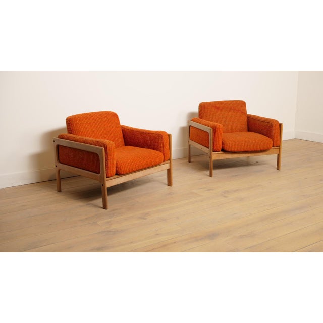 This beautiful set of 2 vintage armchairs is truly an eye-catcher in your mid-century interior. The chairs were designed...