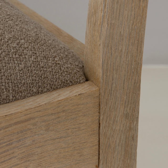 This set of six 1970s Belgian oak dining chairs features a warm, natural finish and a classic ladder-back silhouette that...