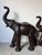 Vintage Safari Style Oversized Leather Elephant Sculptures With Raised Trunks – A Pair For Sale - Image 11 of 18