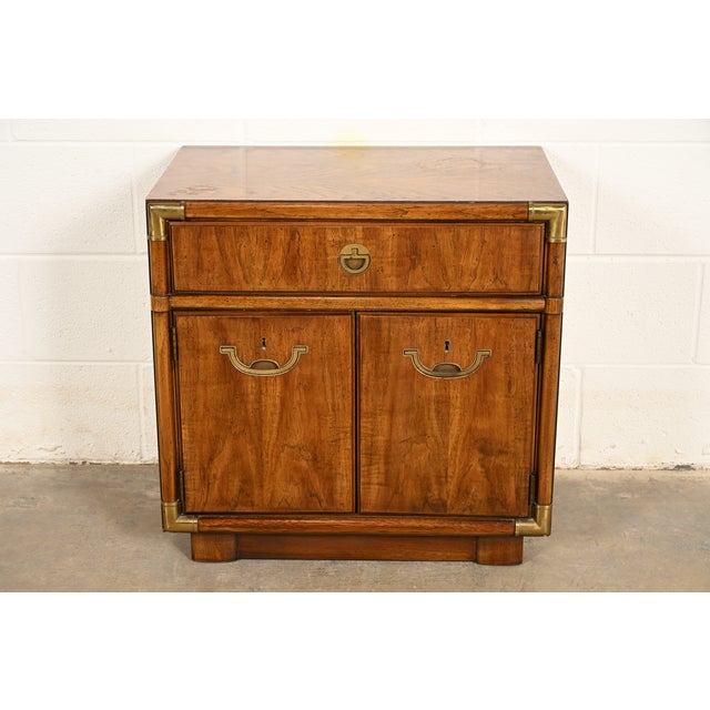 A gorgeous Mid-Century Modern Hollywood Regency Campaign style nightstand or end table By Drexel Heritage USA, Circa 1970s...
