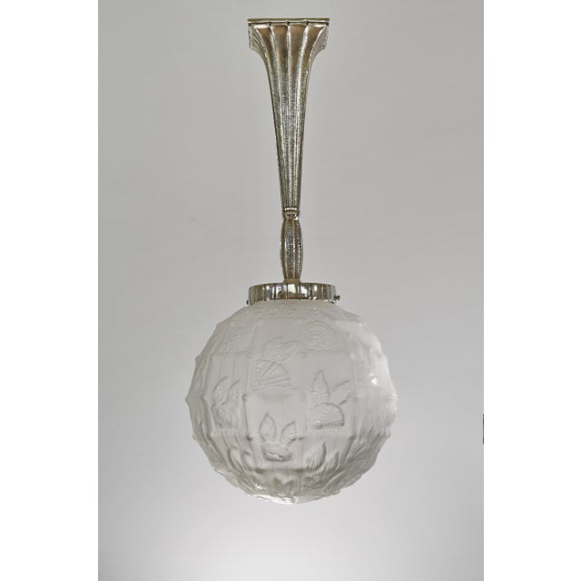 Cherrier & Besnus A wonderful French art deco pendant light in nickeled bronze or solid brass*). The gorgeous mount holds...