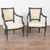 Pair of 19th century Swedish Gustavian armchairs crafted in pine. The chairs feature carved egg and dart detailing along...