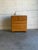 An iconic architectural form balances sculptural curves with clean lines in this classic storage piece. The design...