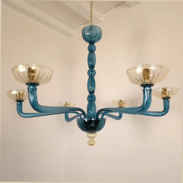 Mid-Century Modern petrol blue and clear-gold Murano glass chandelier Venini style, Italy 1980s The neoclassical style...