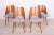 This is a set of 4 Lollipop dining chairs manufactured by Tatra in former Czechoslovakia, The wooden elements have been...