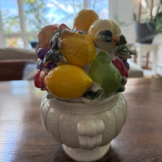 Charming vintage majolica-style ceramic centerpiece overflowing with beautifully modeled three-dimensional fruit,...