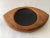 Danish modern eye shape Op Art teak wood dresser tray with black convex lucite center, and felt covered bottom. Convex...