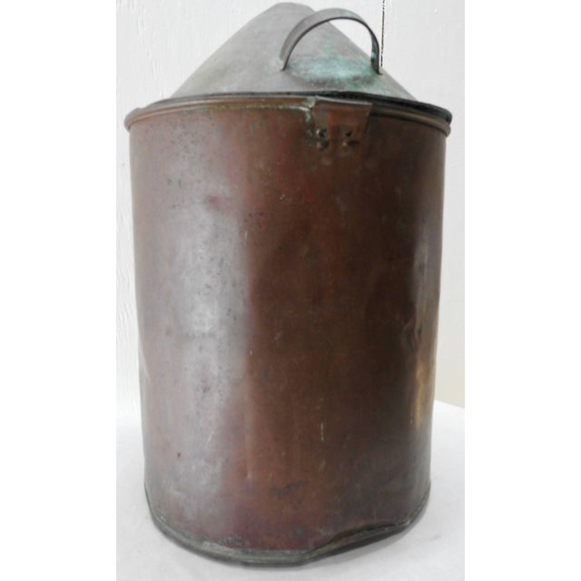 This early 19th century copper still from France will make a great conversation piece. In the shape of a cylinder. The lid...