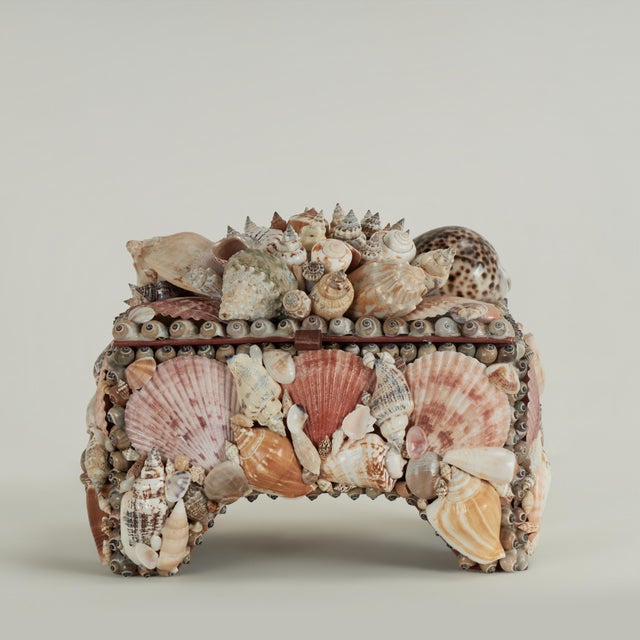 Lofty vintage lidded box ambitiously handcrafted in a lush composition of exotic seashells throughout with a felt lined...