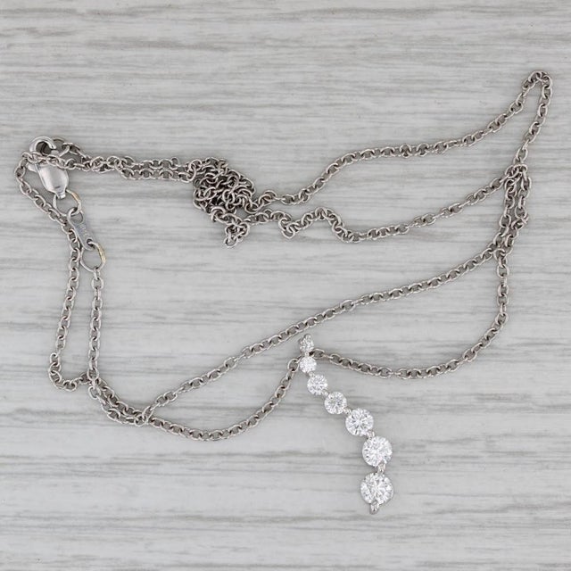 Gemstone Information: - Natural Diamonds - Total Carats - 0.80ctw Cut - Round Brilliant Color - F - G Clarity - SI1 - I1...