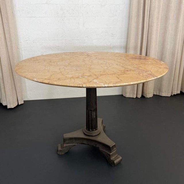 This outstanding Art Deco café bistro dining table strikes a flawless balance between structural geometry and organic...