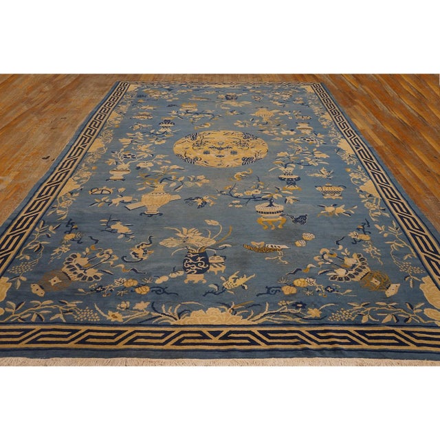 1920s Blue Antique Rectangle Hand Knotted Pile Wool Rug, Circa Date: 1920s. This exceptional early 20th-century piece...