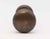 Plain round bronze door knob set with a dark antique patina. The manufacturer is unknown. Priced as two door knobs, two...