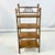 This is a very well kept Antique Scorched Bamboo Ball & Stick Etagere. It’s English from the Aesthetic Movement era of the...