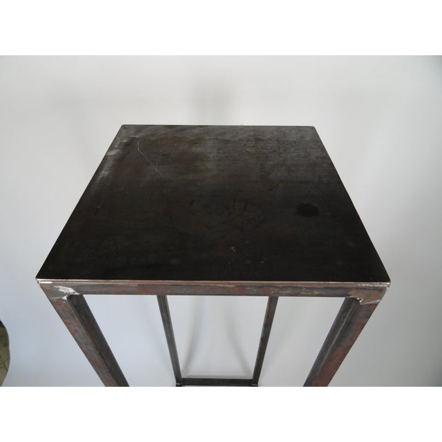 This is a custom metal pedestal in a natural finish. It is designed to hold and display that special object. The contrast...